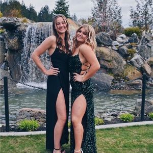 Medium Lucy in the sky green sequin prom dress. Open back slit on both sides.